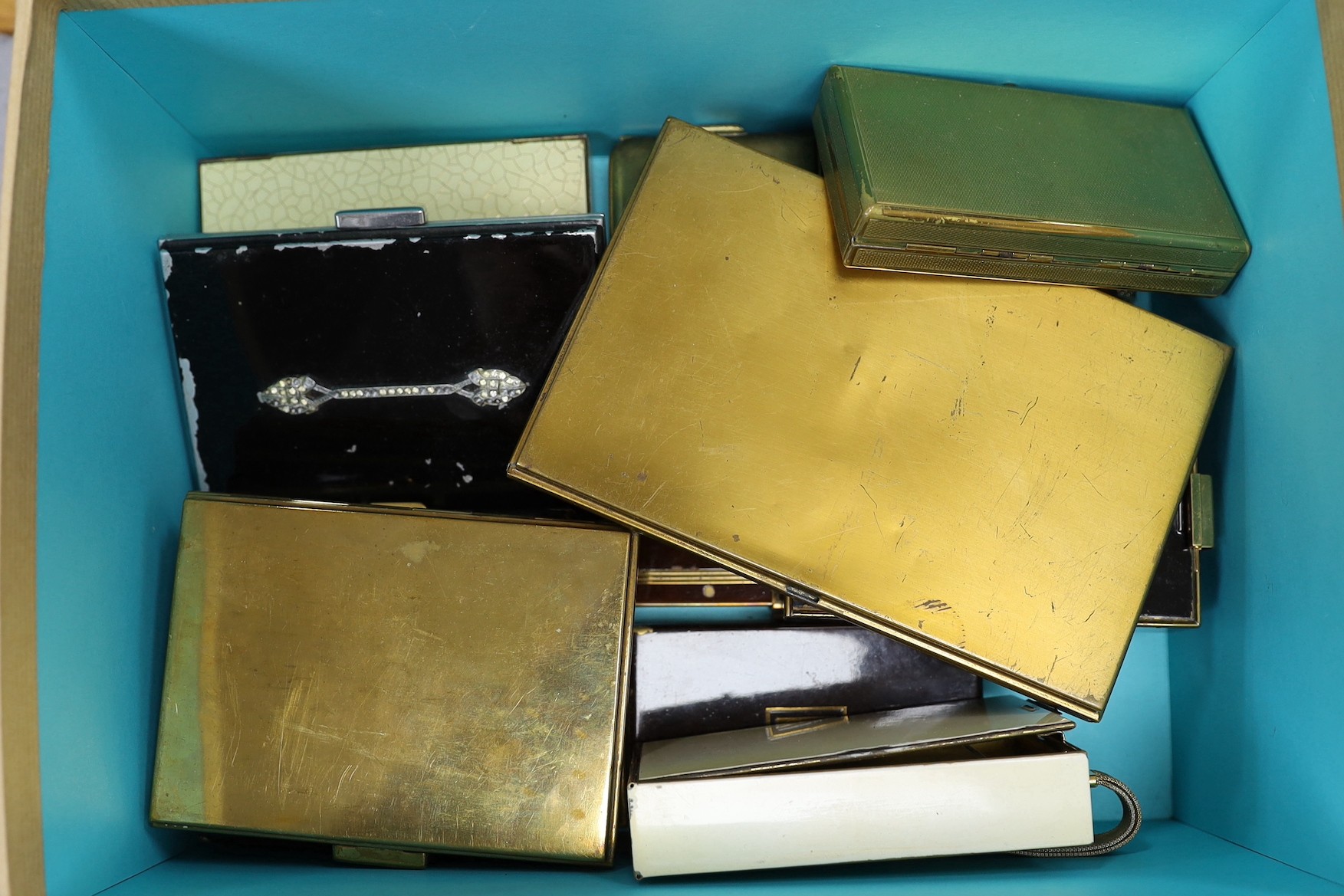 A collection of thirteen mixed metal, enamel, Minaudière from the 1930’s-40’s